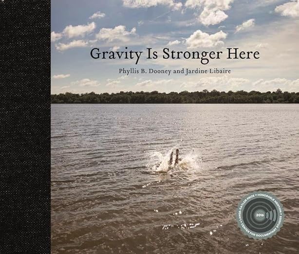 Gravity is Stronger Here / by Alison Morley (Editor), Phyllis Dooney (Photographer), Jardine Libaire (Contributor), Patricia Fabricant (Designer)